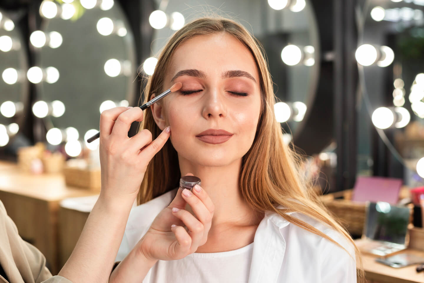 make-up-artist-applying-eyeshadow-woman (1) (1)