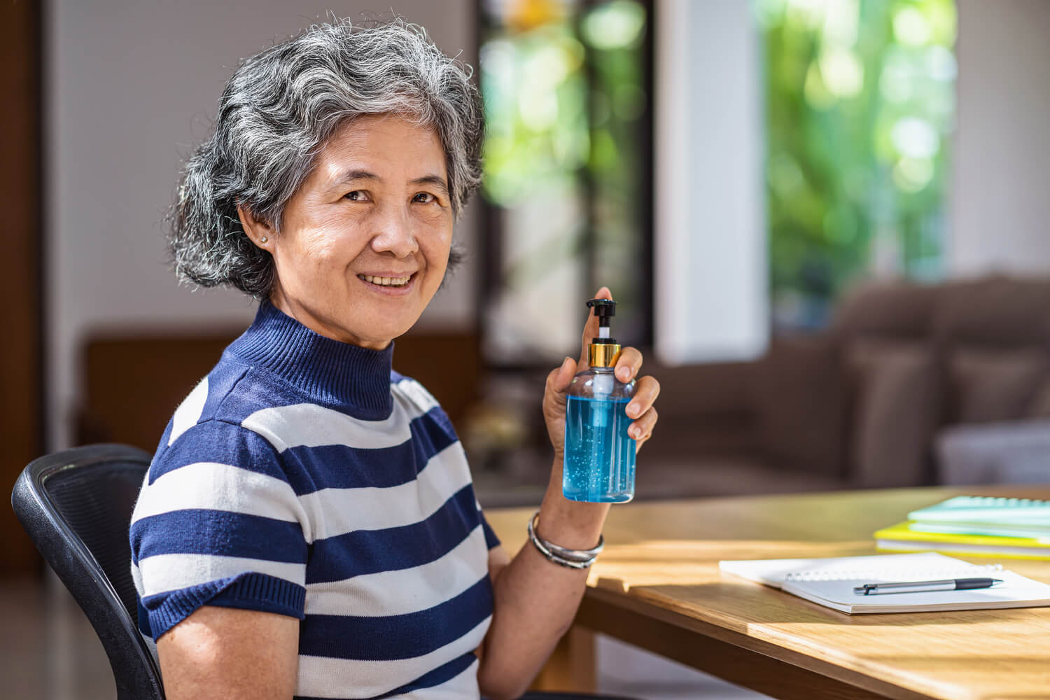 portrait-asian-old-man-woman-showing-hand-sanitizer-by-pumping-alcohol-gel-washing (1) (1)